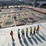 Team inspecting building foundations